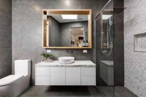 Modern and stylish bathroom, perfectly complementing the right bathroom vanity and the bathroom remodeling service